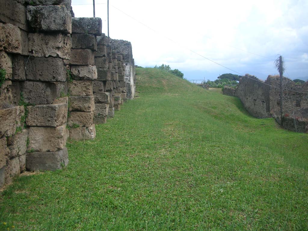 City Walls on north side of Pompeii. May 2010. 
Looking east from near Tower X along agger towards Vesuvian Gate. Photo courtesy of Ivo van der Graaff.